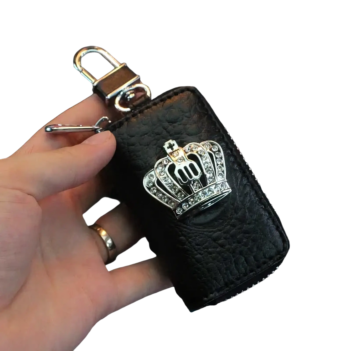 Black textured leather keychain with silver rhinestone crown and metal clasp from crown leather car steering wheel cover set