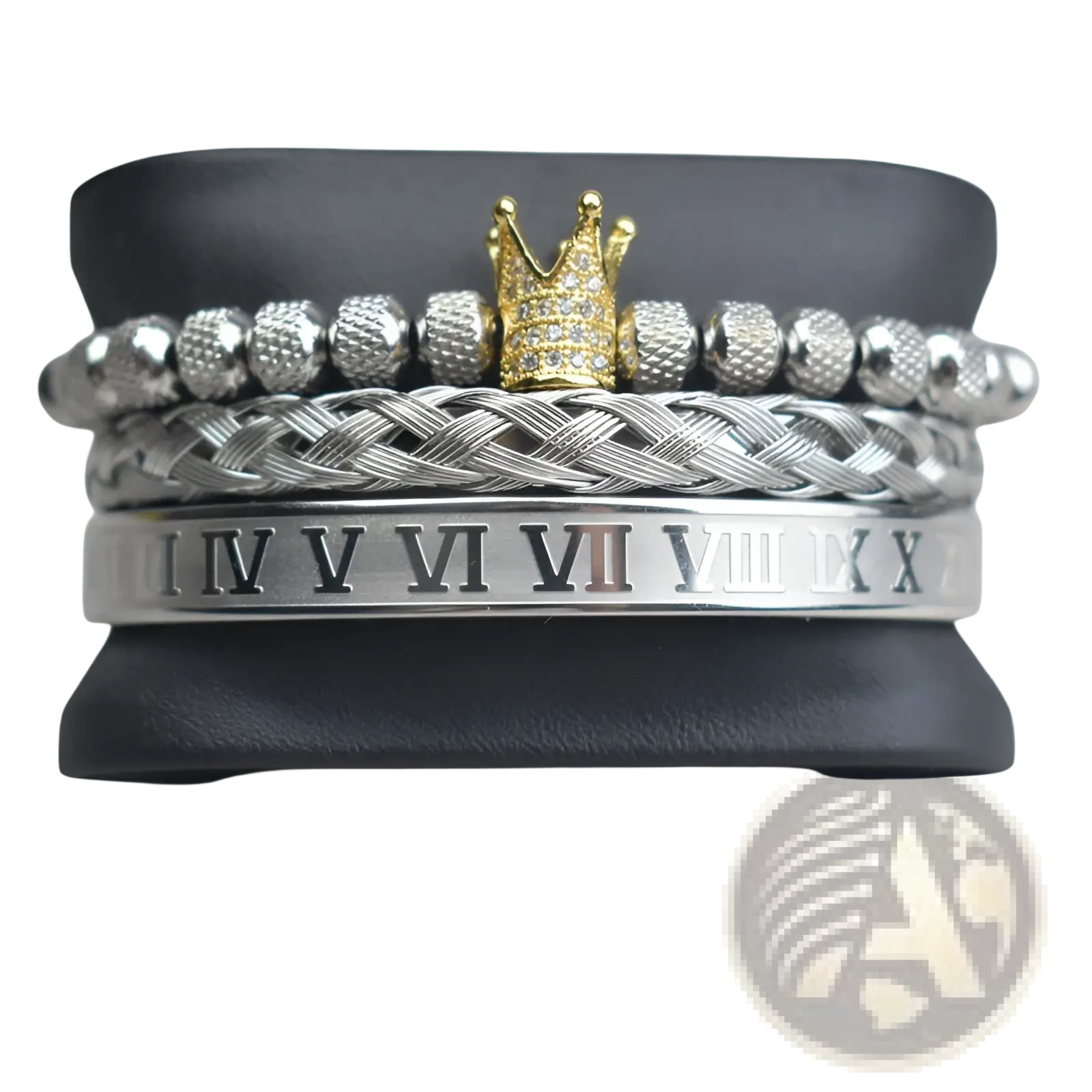 A set of three silver-toned braided bracelets with roman numerals and a gold crown charm with clear stones