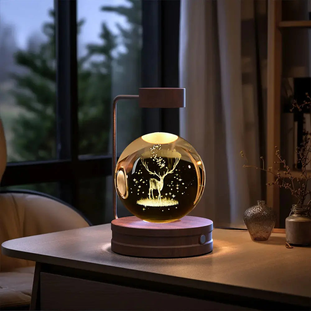 Golden spherical led 3d crystal ball dinosaur night light with illuminated deer design in glass sphere on wooden base