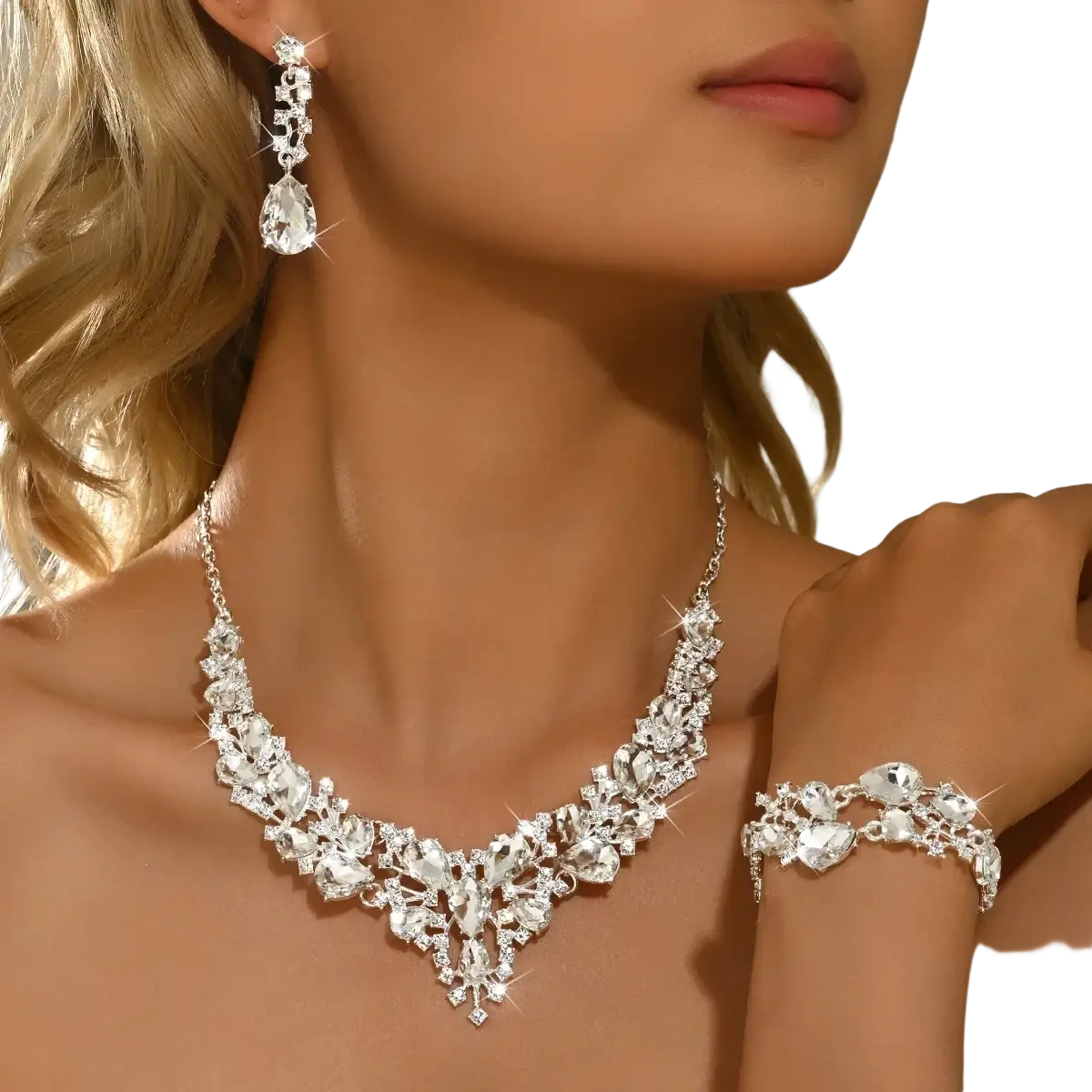 Sparkling silver crystal bridal necklace with cascading teardrop and faceted stones in pink silver design