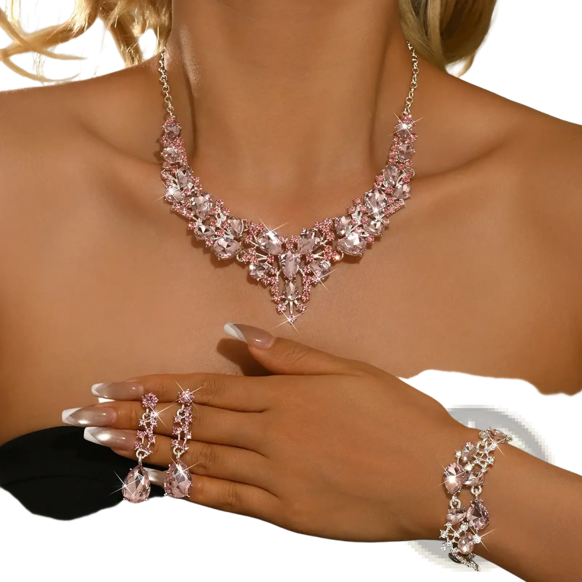 Crystal bridal jewelry set pink silver featuring a sparkling pink crystal necklace with v-shaped centerpiece and matching earrings and bracelet with silver-toned chains and settings