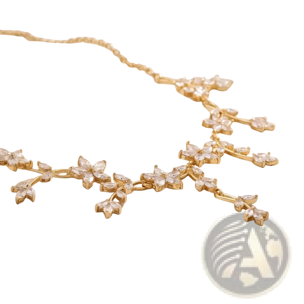 Crystal bridal necklace featuring a delicate gold-toned cascading design of clear faceted crystal flowers and leaves