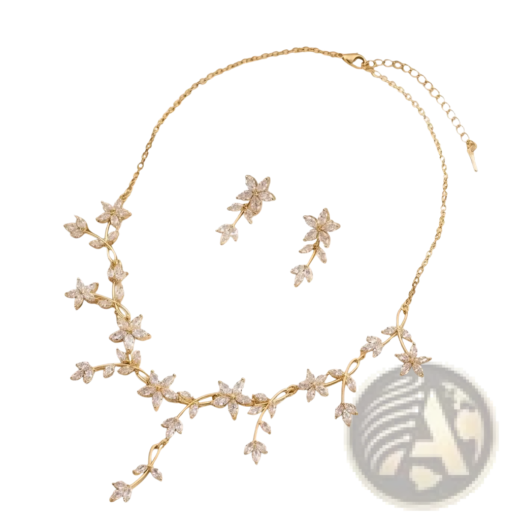 Gold-toned crystal bridal necklace and earring set with delicate floral vine design and sparkling clear crystals