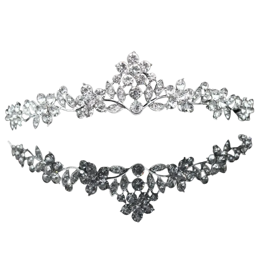 A sparkling silver crystal bridal tiara with intricate floral and leaf designs for wedding headband use