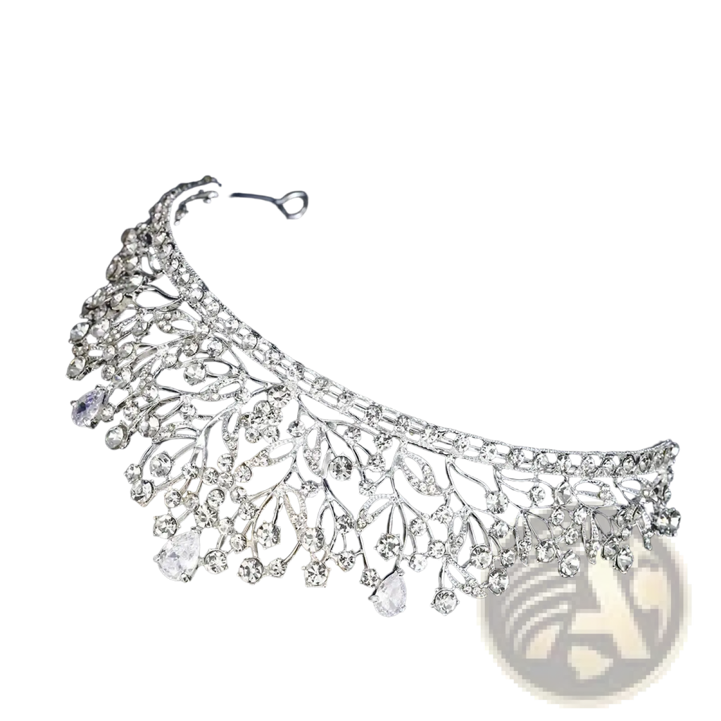 Silver crystal bridal tiara with intricate leaf and vine rhinestone design and dangling teardrop crystals
