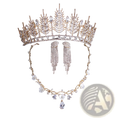 Gold-toned crystal bridal tiara with intricate leaf designs and sparkling clear crystals for wedding headpiece use