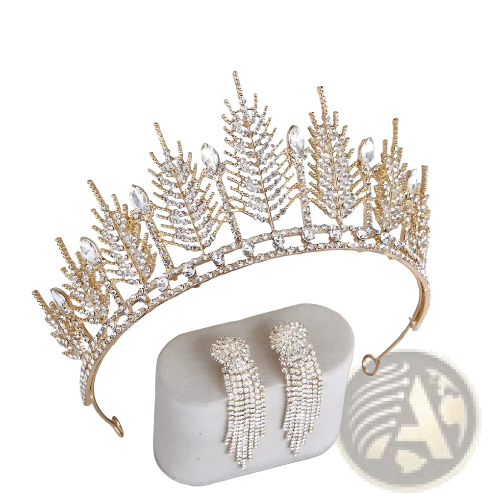 Gold crystal bridal tiara with clear crystals and leaf designs displayed in a white box with matching earrings