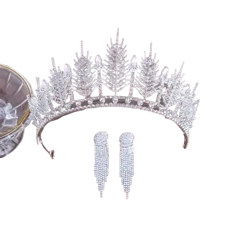 Crystal bridal tiara silver feather-themed adorned with sparkling crystals and rhinestones wedding crown headpiece