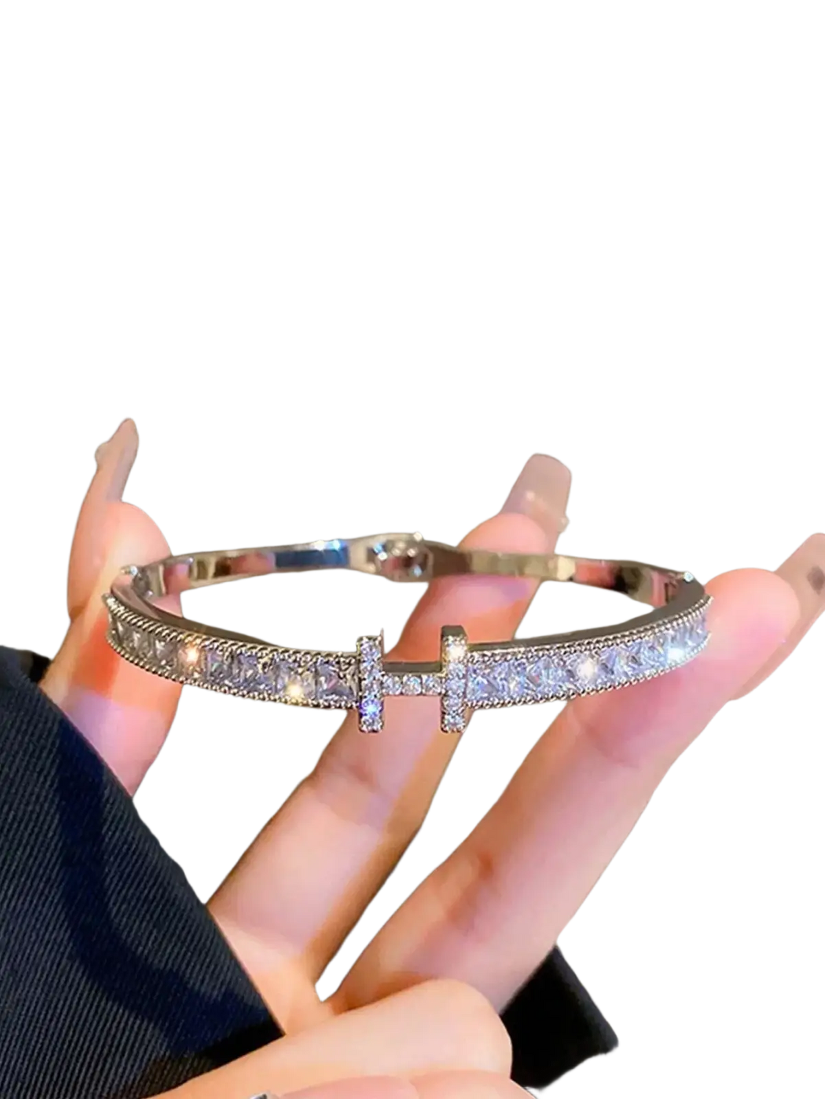 Silver-toned crystal cross cuff bracelet with clear sparkling stones and a central t-shaped accent stone