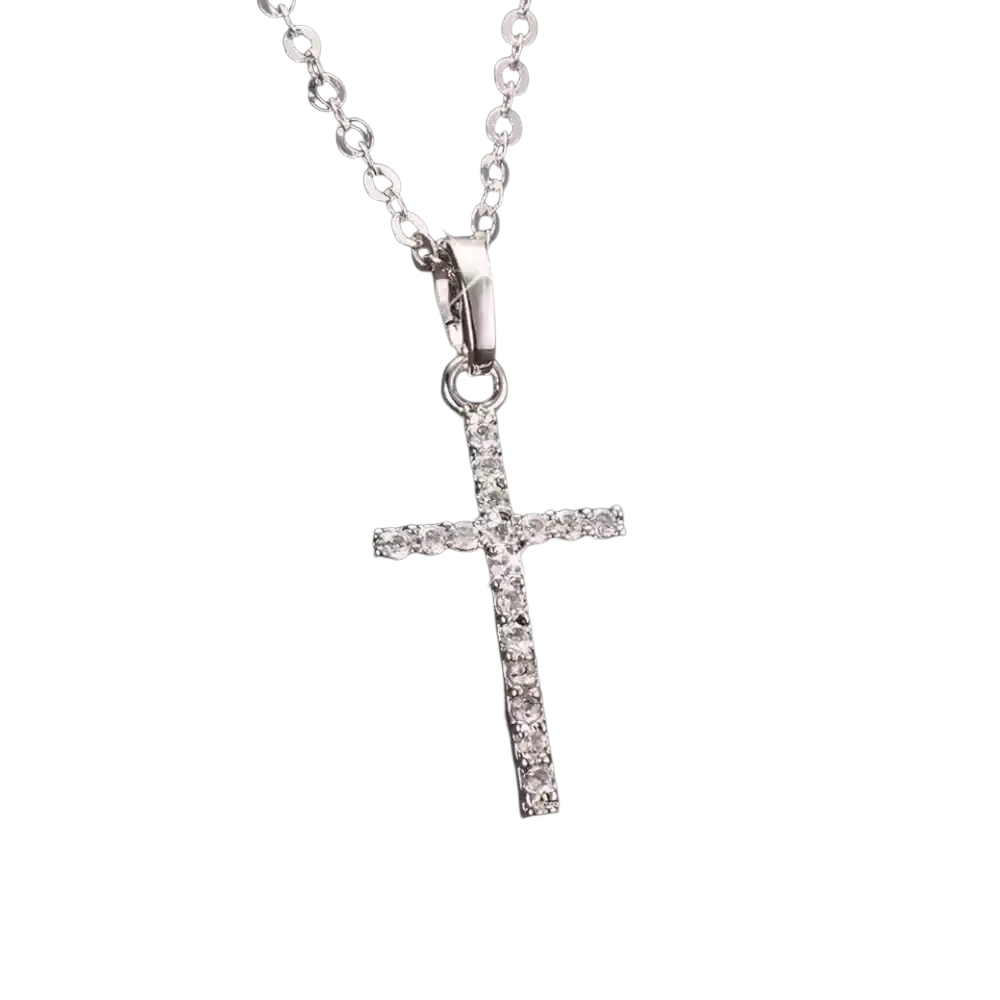 A crystal cross pendant necklace in silver featuring clear cubic zirconia stones on a delicate chain