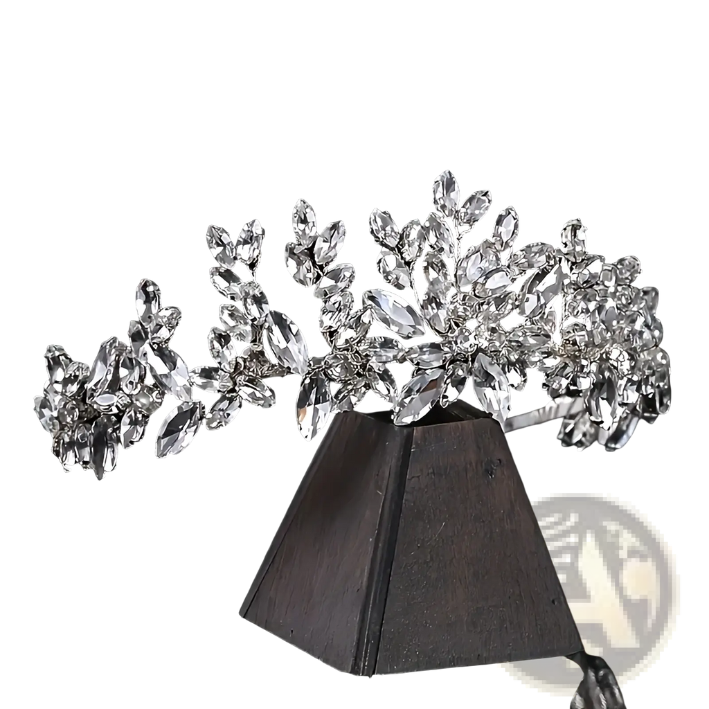 A sparkling silver crystal floral bridal tiara headband with clear faceted crystals in an elegant leaf design