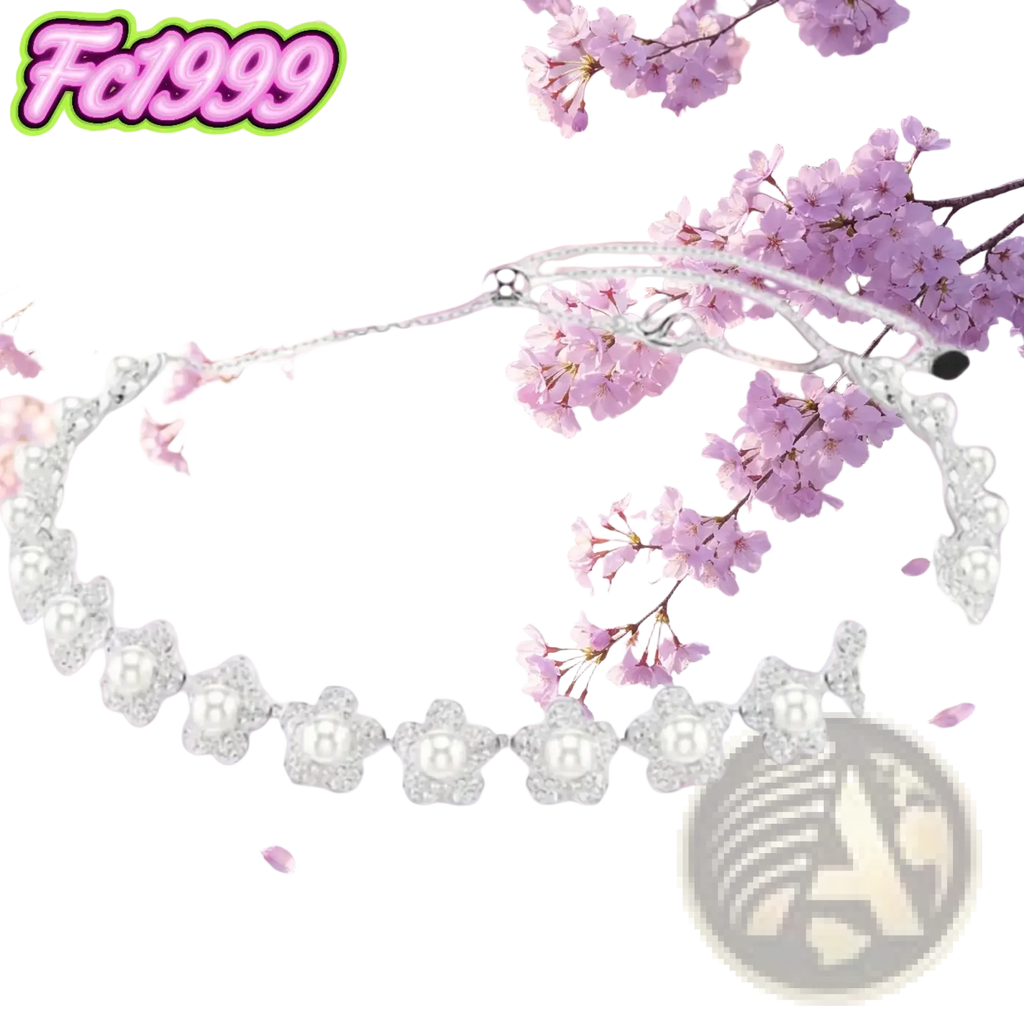 A delicate silver crystal flower bridal necklace with pearl beads set against soft pink cherry blossoms