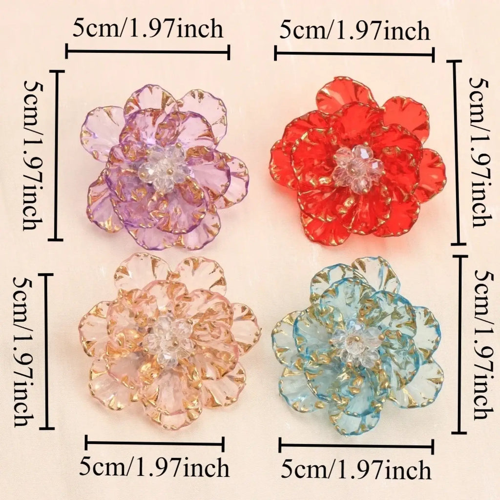 Crystal flower brooch fashion accessory with four translucent 5cm flower embellishments in purple red peach and blue with crystal centers
