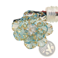 Crystal flower brooch with delicate light blue glass petals trimmed in gold and a clear crystal center fashion accessory