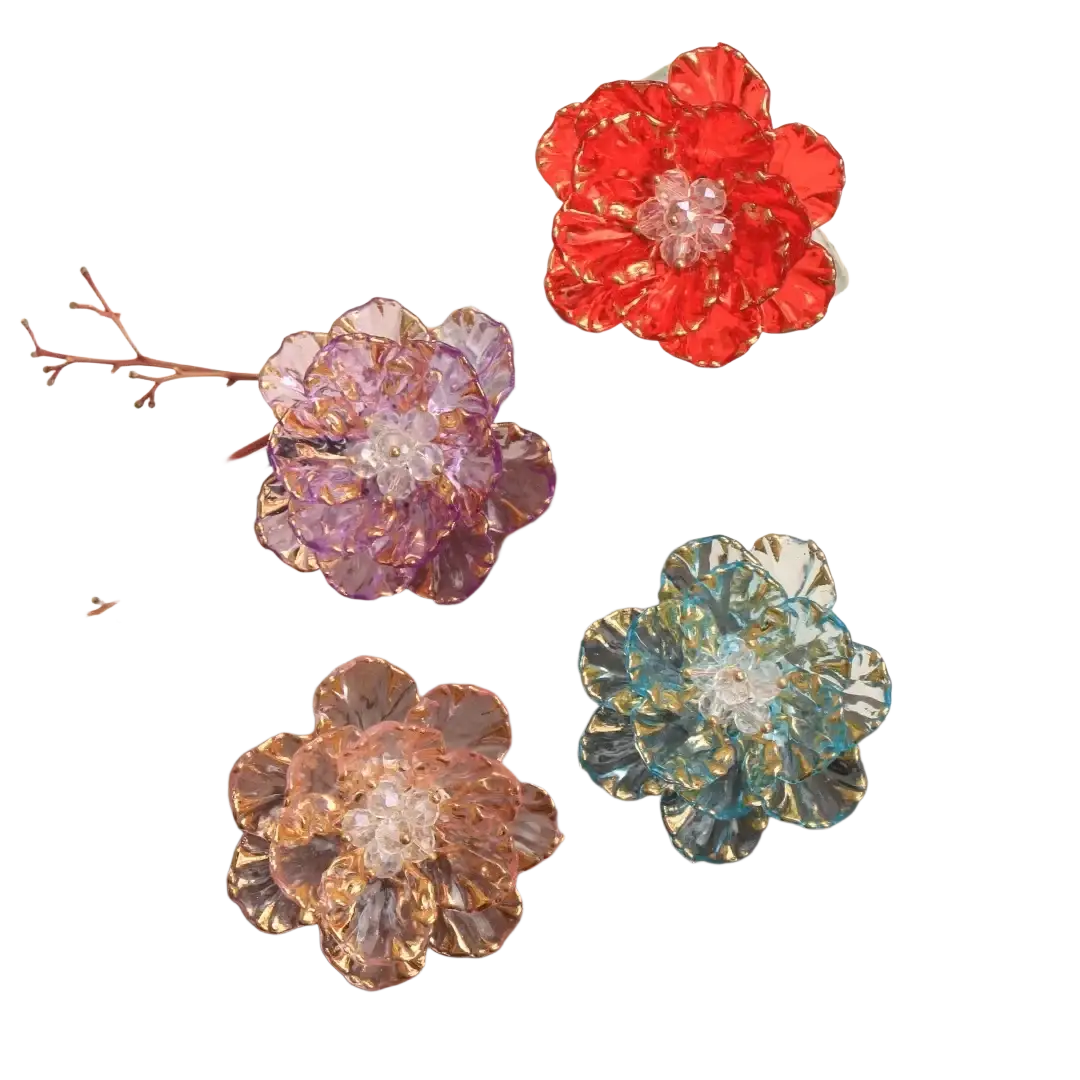 Crystal flower brooch fashion accessory with vibrant translucent glass flower hair clips in red purple blue and peach hues