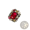 Crystal flower brooch pin for women featuring a red rectangular crystal with pearls and gold-toned accents in metal frame
