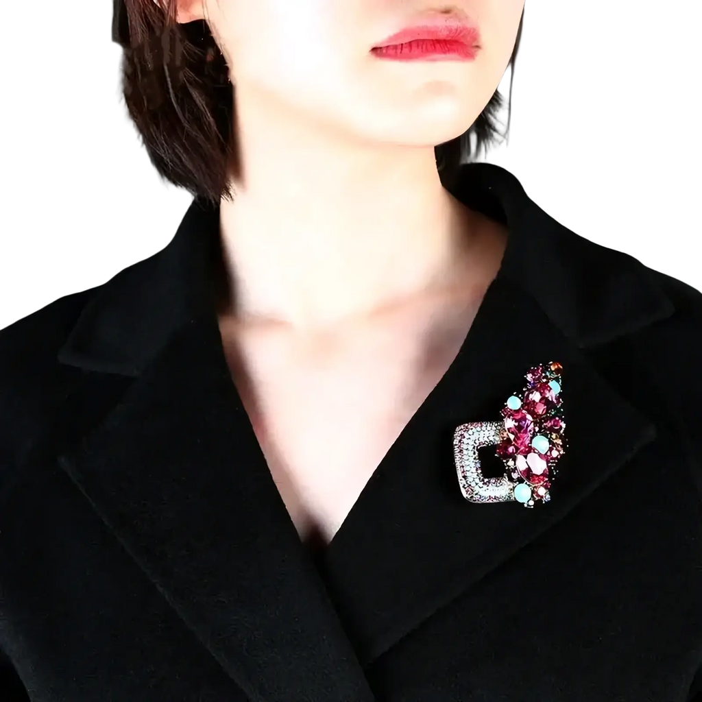 Crystal flower brooch pin for women with a silver-toned square base and multicolored pink purple teal and clear stones