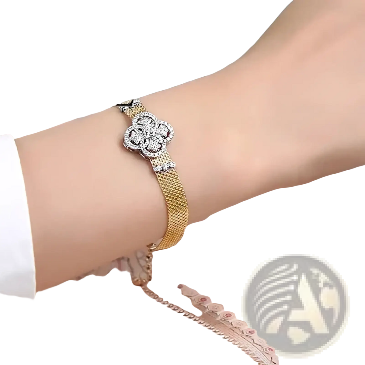 Crystal flower gold mesh cuff bracelet featuring a sparkling four petal flower clasp with clear crystals