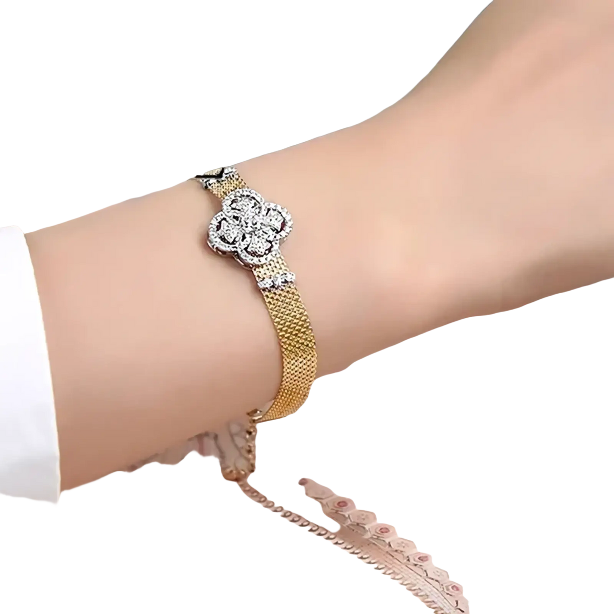 Crystal flower gold mesh cuff bracelet featuring a sparkling four petal flower clasp with clear crystals