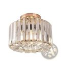 Crystal flush mount ceiling light with rose gold metal base and clear faceted crystal prisms in vertical columns