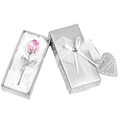 A crystal glass rose gift for valentine’s day with pink crystal flower and silver metallic stem in a silver gift box
