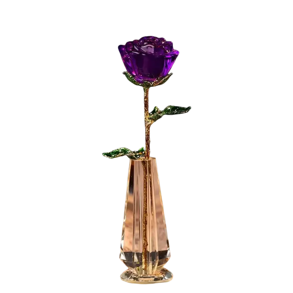 A sparkling purple crystal glass rose with gold-leaf stem and green leaves in a faceted clear vase for Valentine’s Day gift