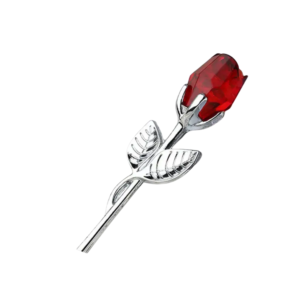 A shiny silver rose-shaped pin with a faceted red crystal head and detailed leaf design for valentines day gift