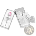 A crystal glass rose gift for valentine’s day with pink crystal flower and silver metallic stem in a silver gift box