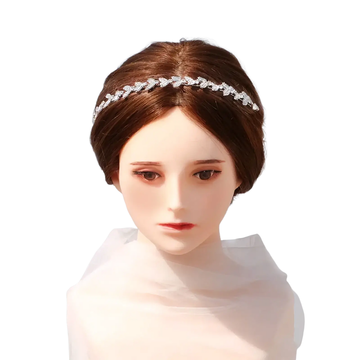 A delicate silver crystal leaf bridal headband adorned with sparkling rhinestones as a wedding hair accessory