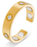 Gold crystal magnetic therapy ring in gold tone with three clear round-cut gemstones and inner neodymium magnets visible