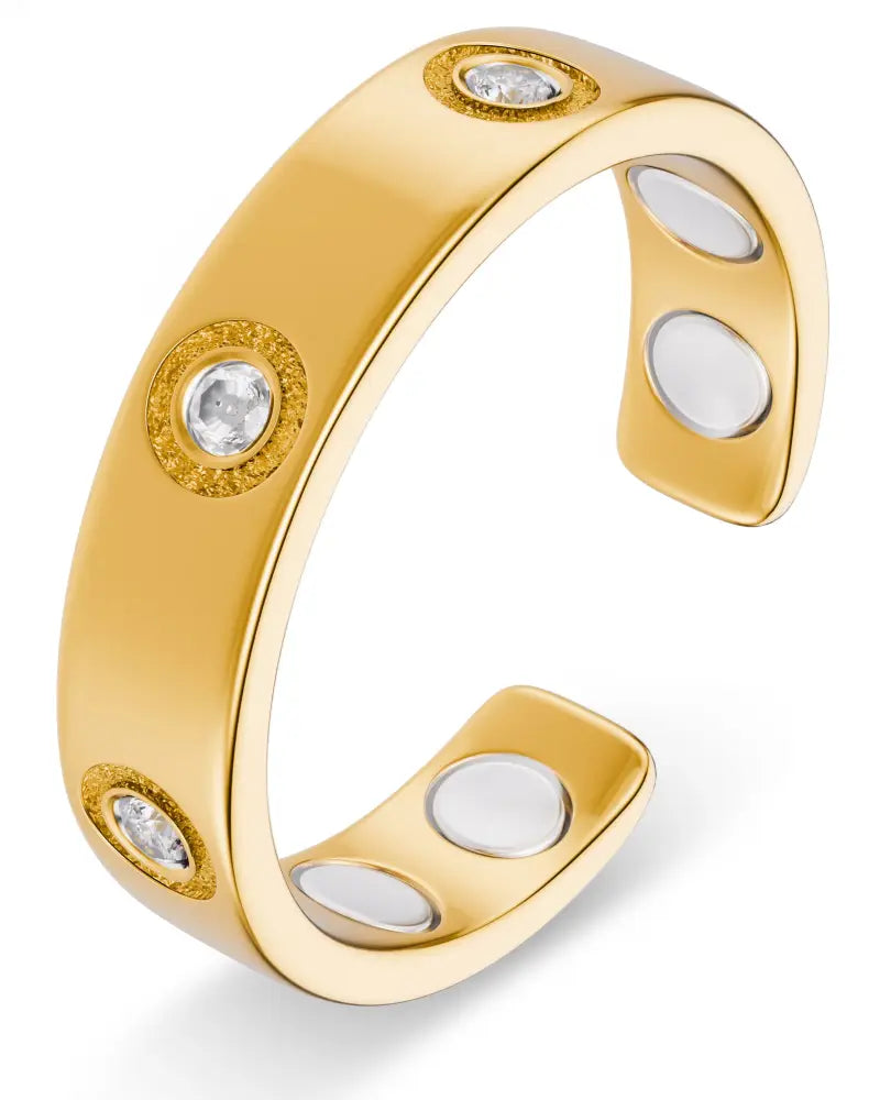 Gold crystal magnetic therapy ring in gold tone with three clear round-cut gemstones and inner neodymium magnets visible