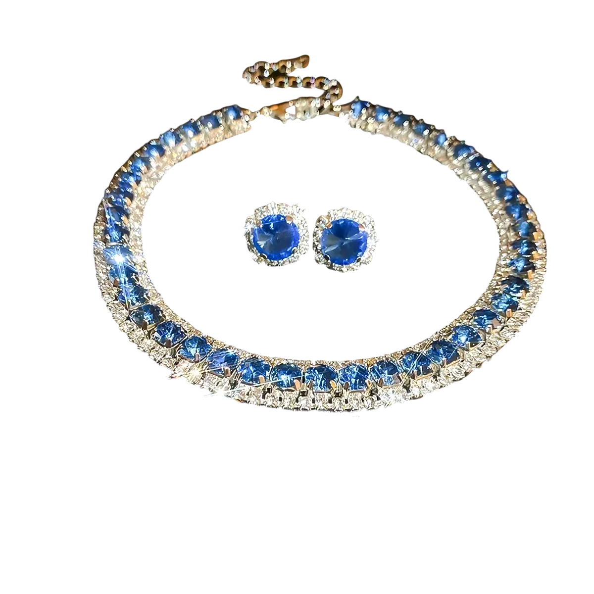 Crystal necklace and earring set featuring dazzling blue sapphire and diamond stones on silver-toned metal for weddings