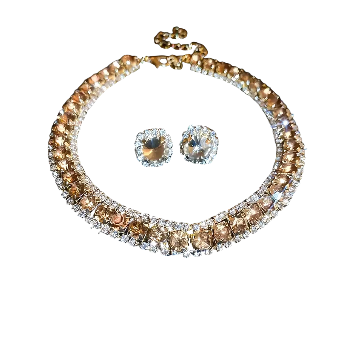 A sparkling gold-toned crystal necklace and earring set with amber and clear rhinestones for pink ab wedding jewelry