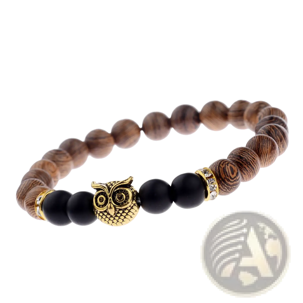 Wooden and onyx bead bracelet with a gold owl charm featuring crystal accents for stylish accessory wear