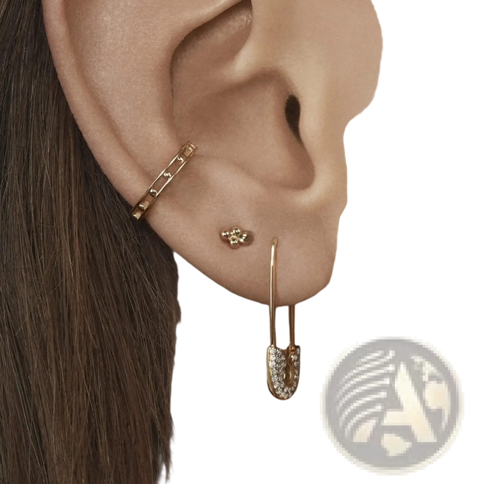Gold-toned safety pin earring adorned with clear sparkling crystals in the crystal pave safety pin accessory set