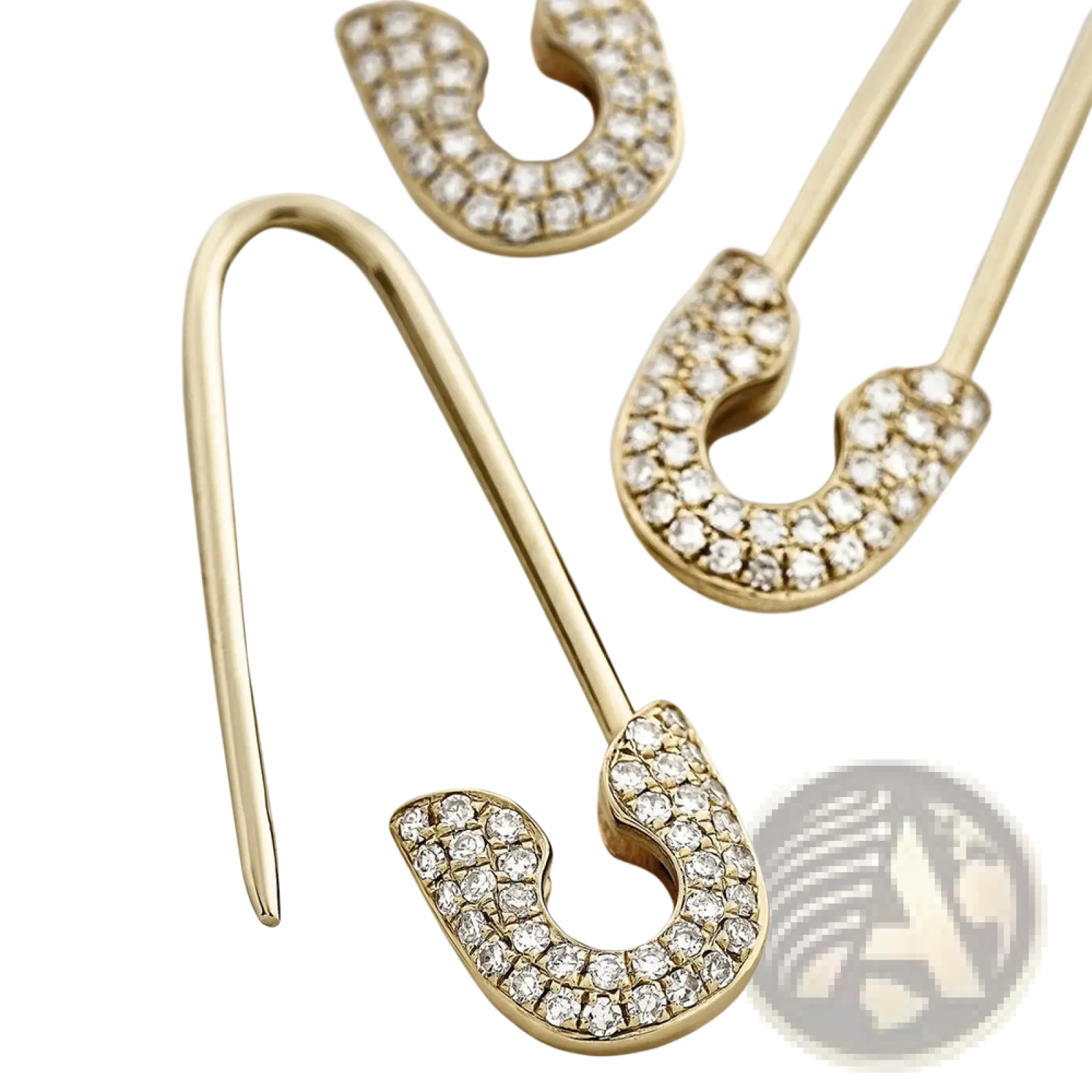 Gold-toned safety pin earrings with crystal pave setting in the crystal pave safety pin and studded accessory set