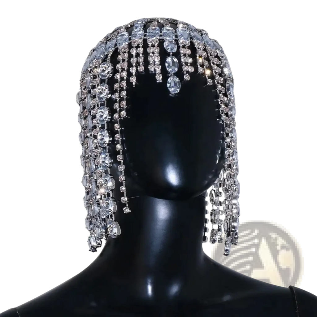 A dazzling silver crystal rhinestone bridal head chain hair jewelry with cascading clear oval-shaped rhinestone strands