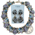 Crystal rhinestone statement necklace set featuring a gold-toned floral design with blue purple rhinestones and clear crystals