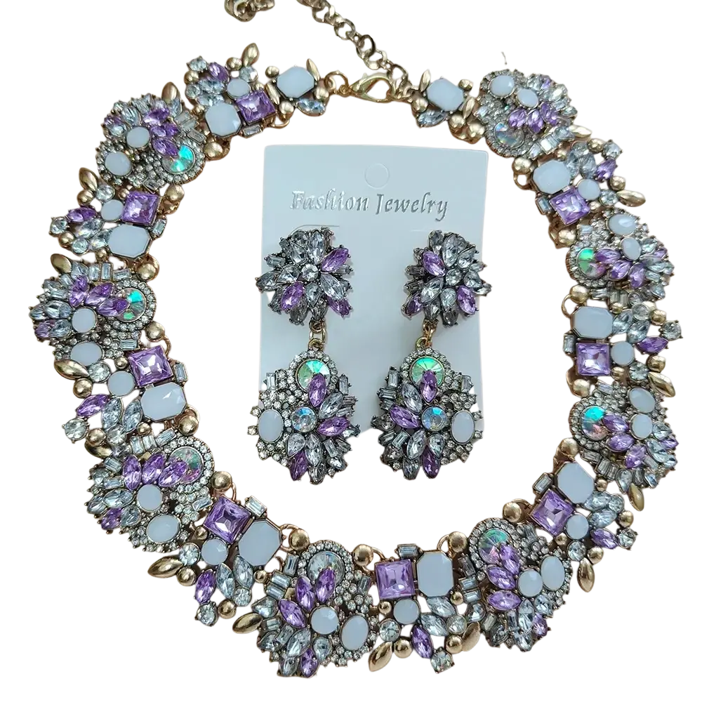 Crystal rhinestone statement necklace set with matching earrings featuring purple and silver floral design on gold metal