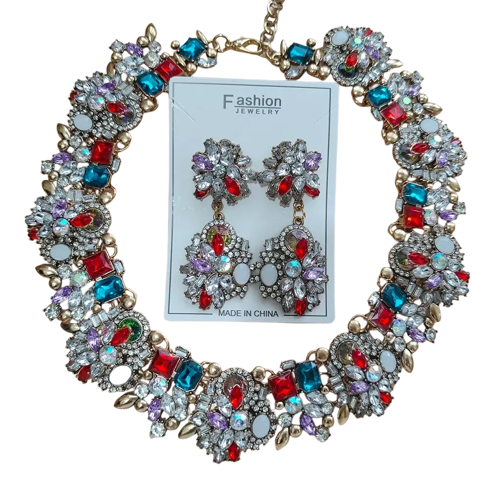 A crystal rhinestone statement necklace set with colorful red blue purple and clear rhinestones on gold-tone metal