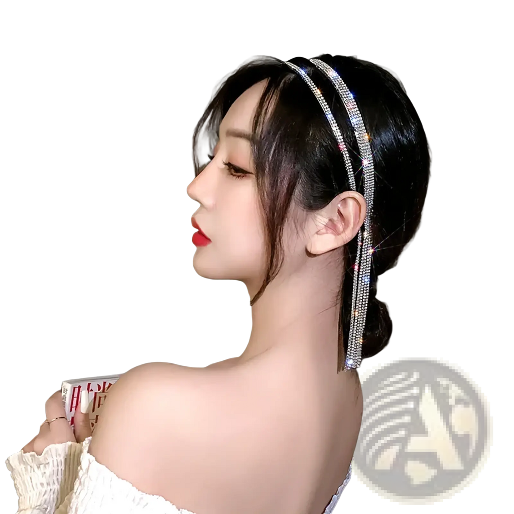 Crystal rhinestone tassel headband for women in sparkling silver with cascading crystal strands and rhinestone embellishments