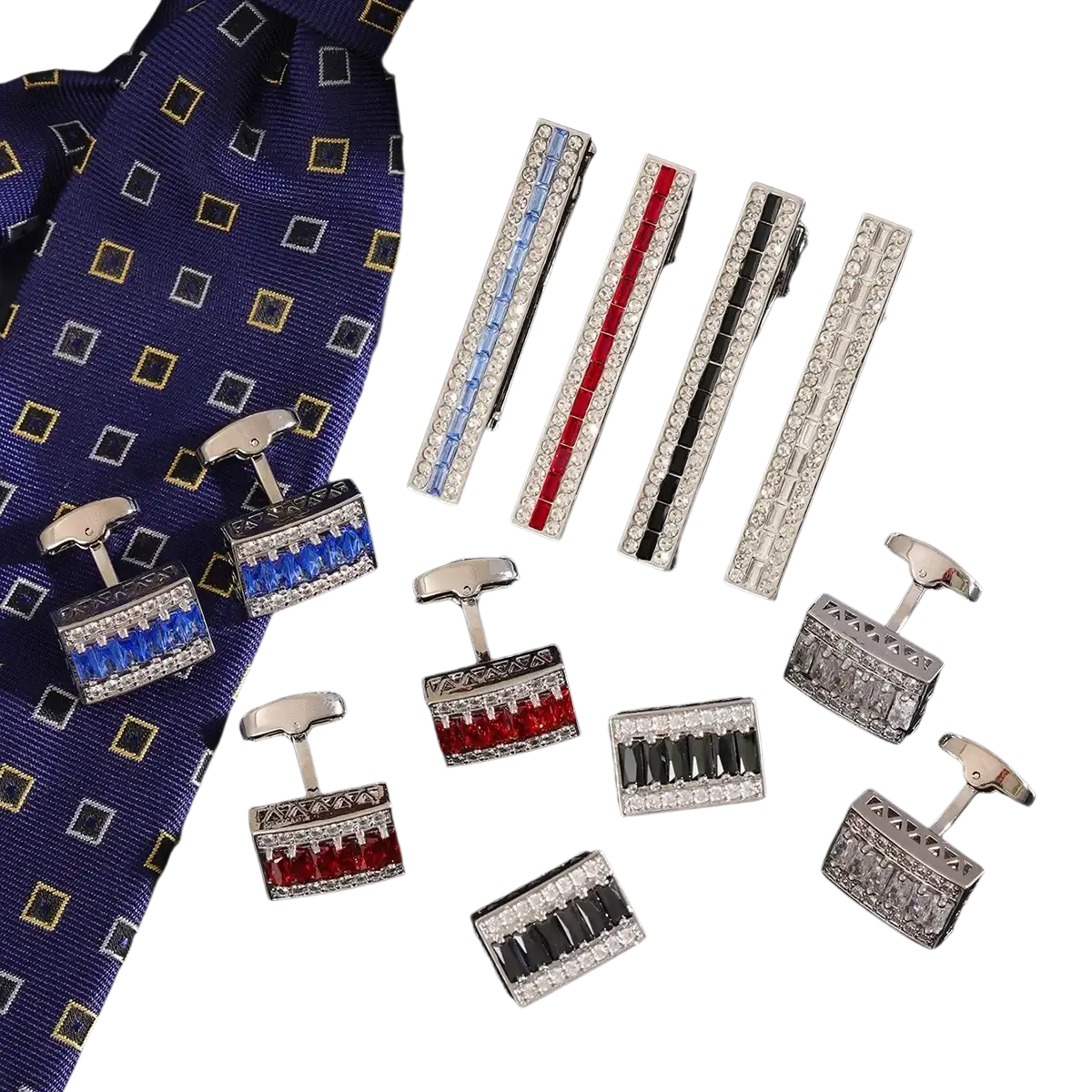 Set of silver-toned crystal rhinestone cufflinks and tie clips with blue red black and clear rectangular designs