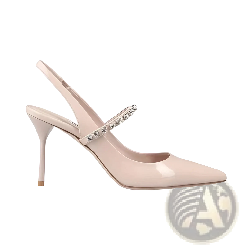 A sleek nude patent leather crystal satin slingback pointed toe high heel with a slender heel and decorative strap