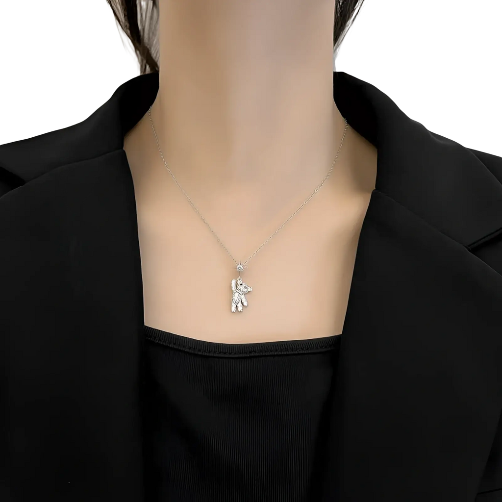 Silver unicorn pendant necklace with sparkling crystal details made of titanium steel and gold for elegant wear