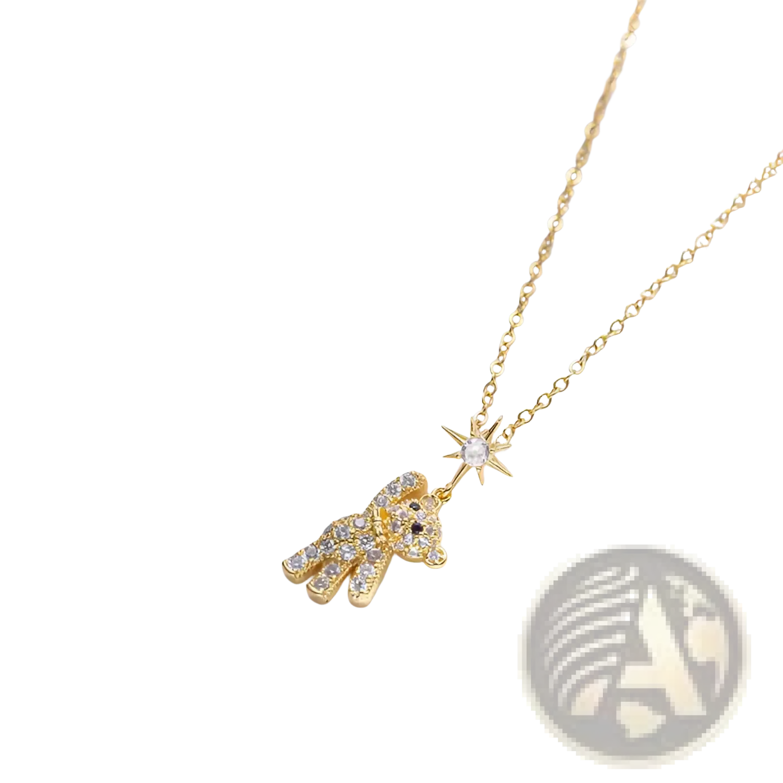 Gold-toned titanium steel necklace with a sparkling bear pendant adorned with clear crystals and a matching star charm