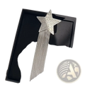 A sparkling silver crystal star tassel brooch lapel pin with dangling chain tassels for elegant accessorizing