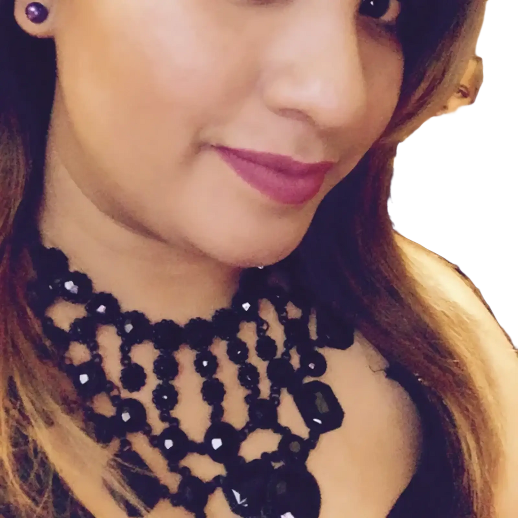 Black beaded crystal statement necklace with multicolored faceted beads in a bohemian cascading choker design