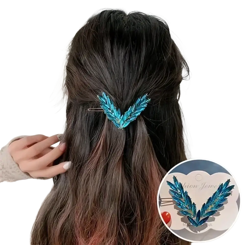 Crystal v shape hair clip set featuring a shimmering blue feather-shaped clip with a metallic finish