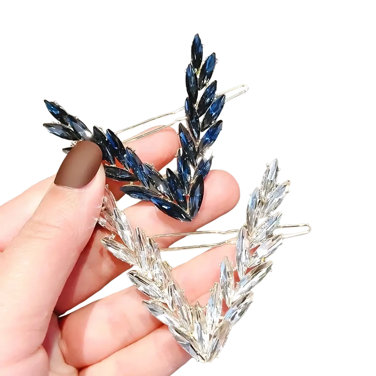 Two elegant crystal v shape hair clips with deep blue and clear faceted crystals on silver wheat stalk bases