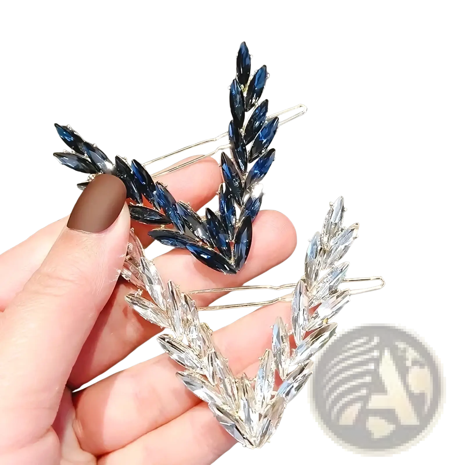 Two elegant crystal v shape hair clips with deep blue and clear faceted crystals on silver wheat stalk bases